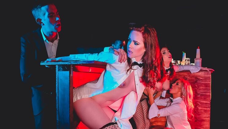 Redhead and Brunette Give Handjob at Indoor Glory Hole